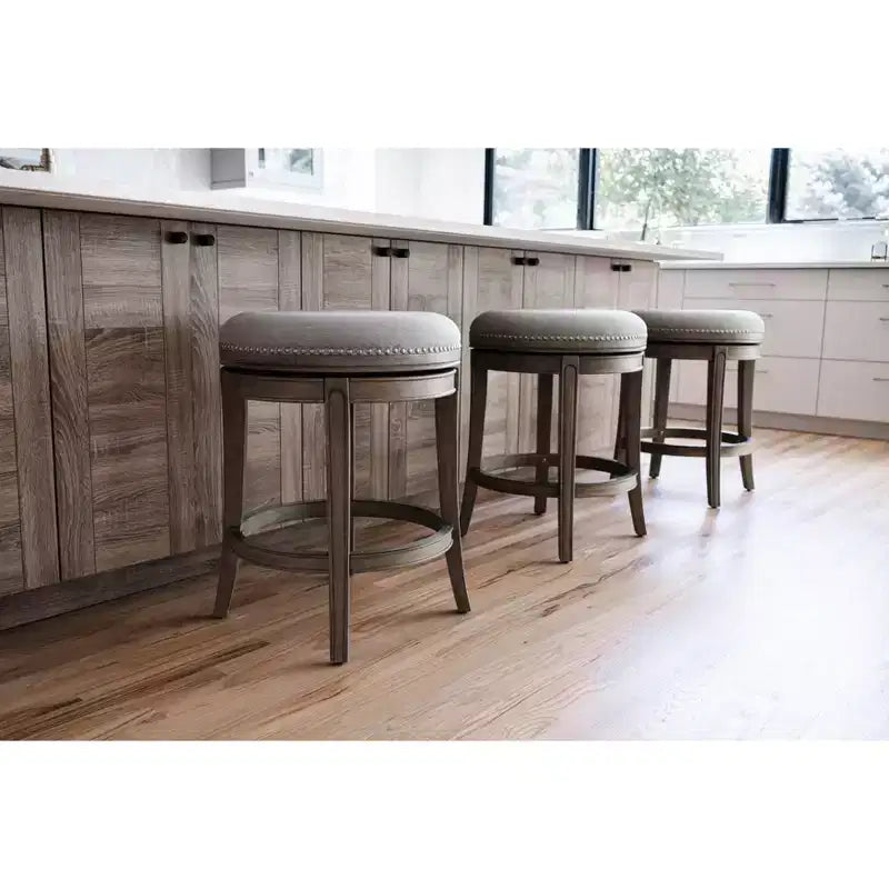 Tabouret de comptoir pivotant sans dossier avec revêtement en tissu