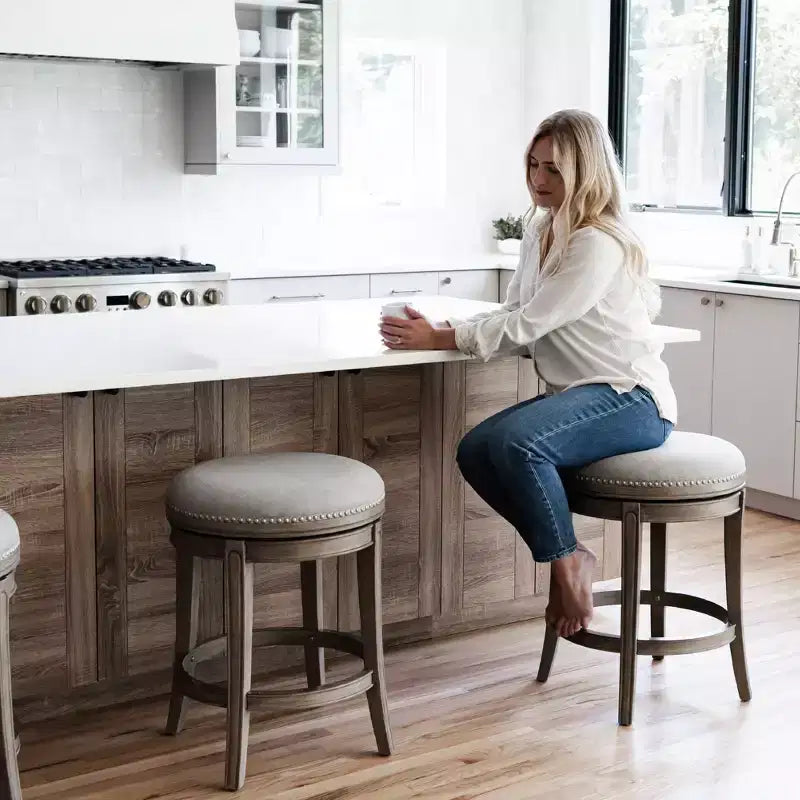 Tabouret de comptoir pivotant sans dossier avec revêtement en tissu